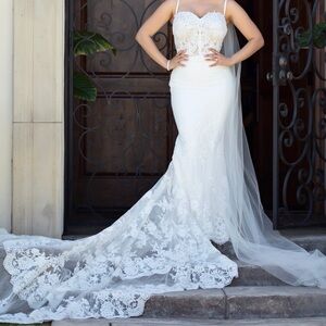 Enzoani Elegant Lace Bridal Gown with Long Train